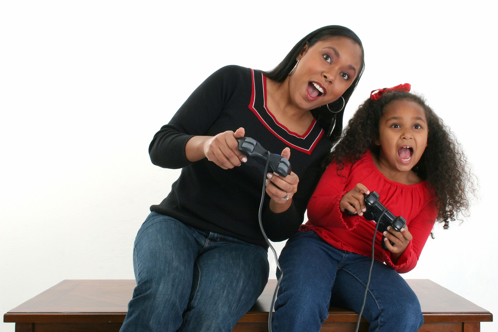 Mother and Daughter Play Video Game