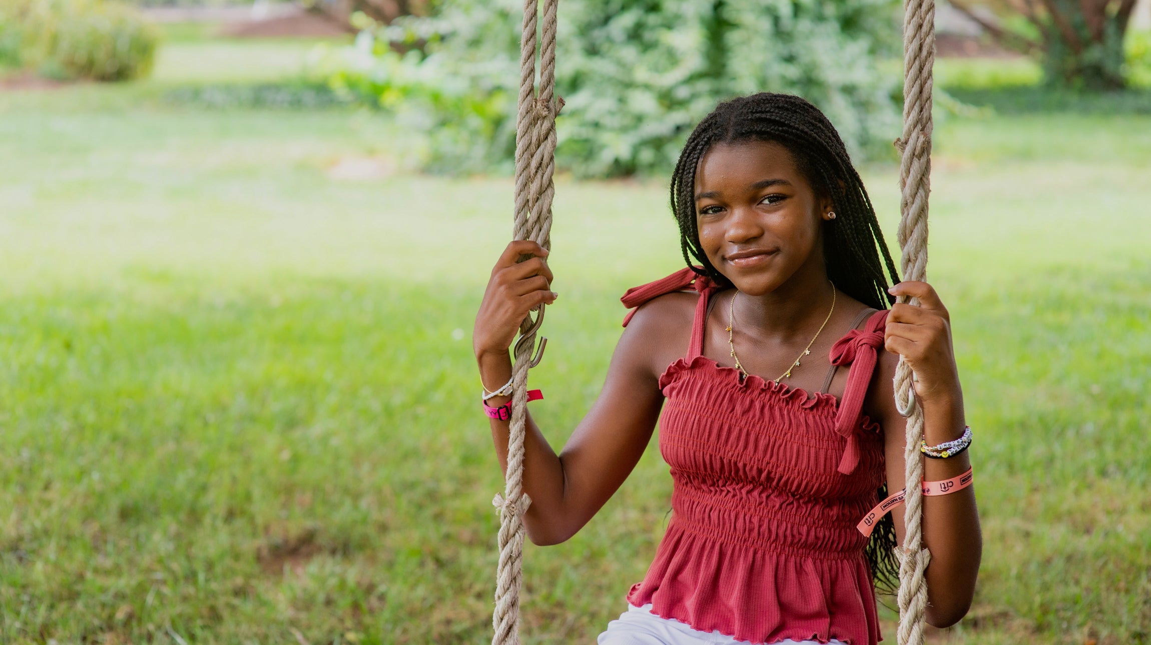 Bellen Woodard on a Swing