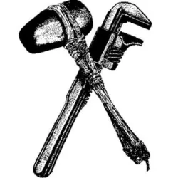 Logo of Earth First with wrench and stone hammer